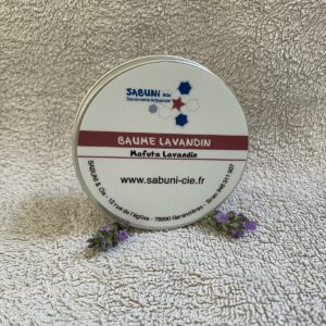 Photo d'un pot de baume Sabuni & Cie posé sur une serviette